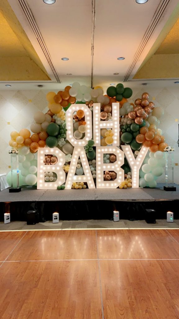 port dover marquee letters surrounded by balloon decor.