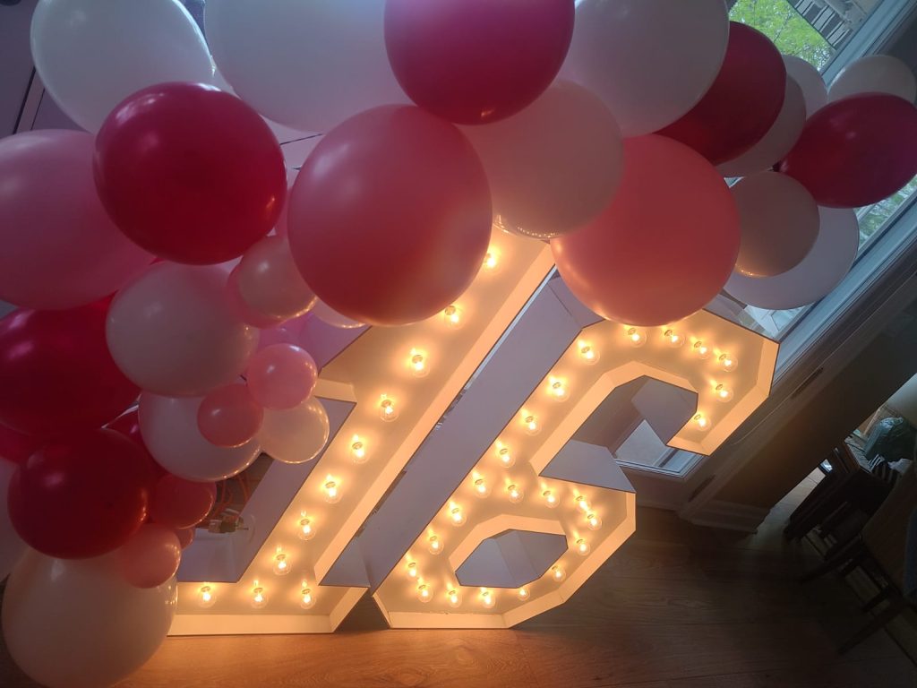 Quinte West balloon garlands and marquee numbers